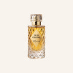 Perfume bottle labeled 'Oud Cristal Noir' on a light beige background