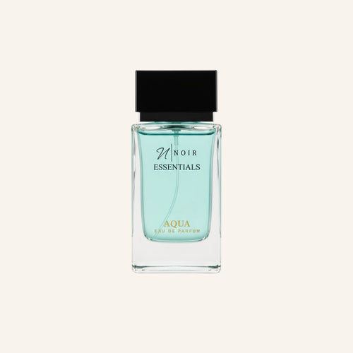 Perfume bottle labeled 'noir Essentials Aqua' on a white background