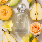noir Dewy Blossom perfume bottle surrounded by sliced pears, melons, and flowers on a light background