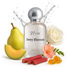 Perfume bottle labeled 'Noir Dewy Blossom' with pear, melon, flowers, and fruits on a white background