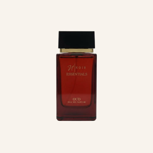 Red perfume bottle with black cap on a white background