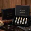 Set of men's perfume in a 'Noir' branded box on a wooden surface.