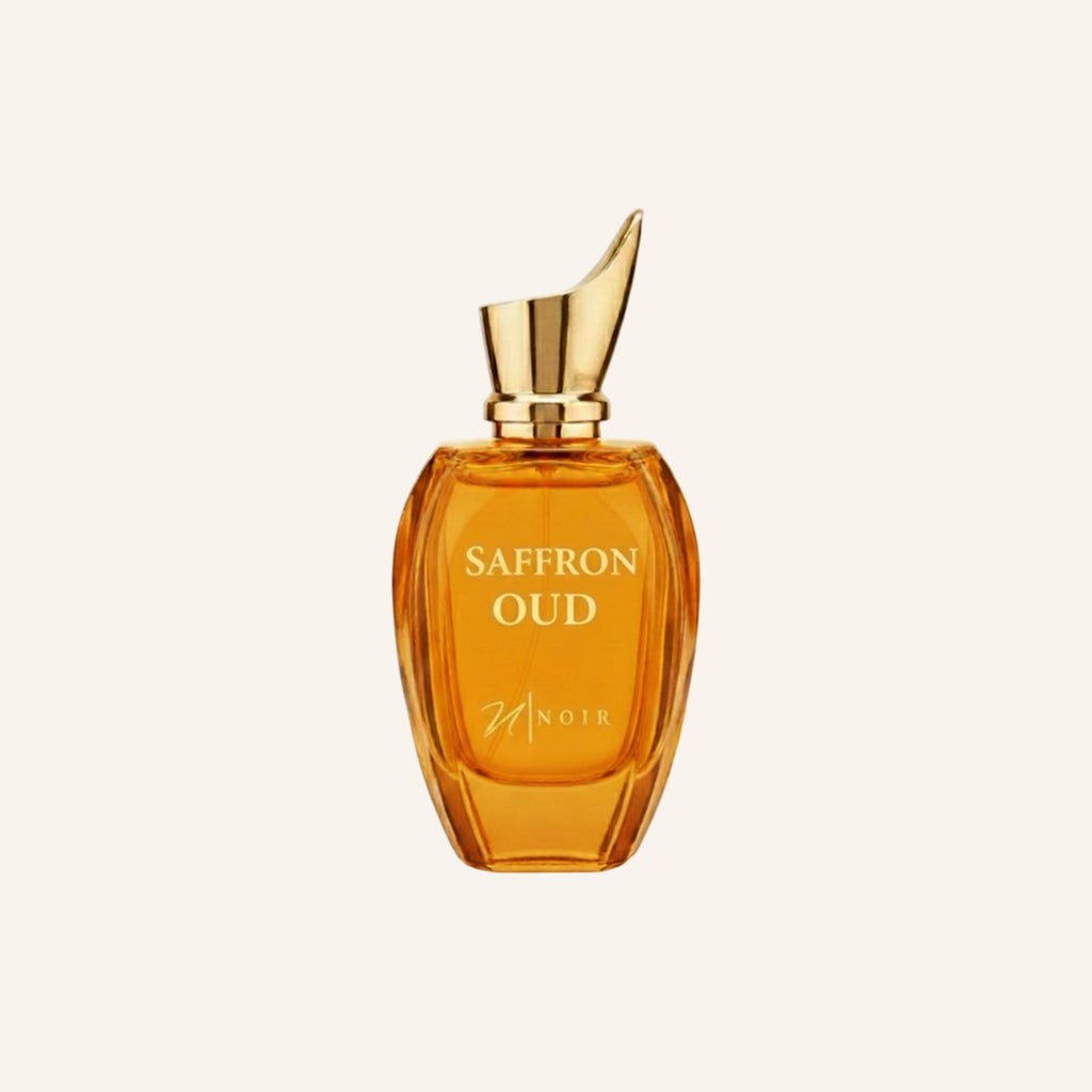 Perfume bottle labeled 'Saffron Oud' with a gold cap on a white background