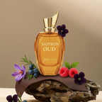 Perfume bottle labeled 'Saffron Oud' with flowers on a beige background