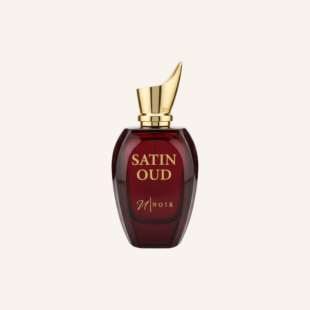 Perfume bottle labeled 'Satin Oud' with a gold cap on a white background