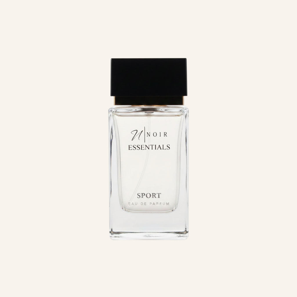 Perfume bottle labeled 'Noir Essentials Sport' on a white background